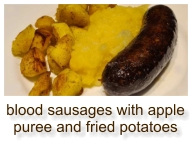 blood sausages with apple puree and fried potatoes